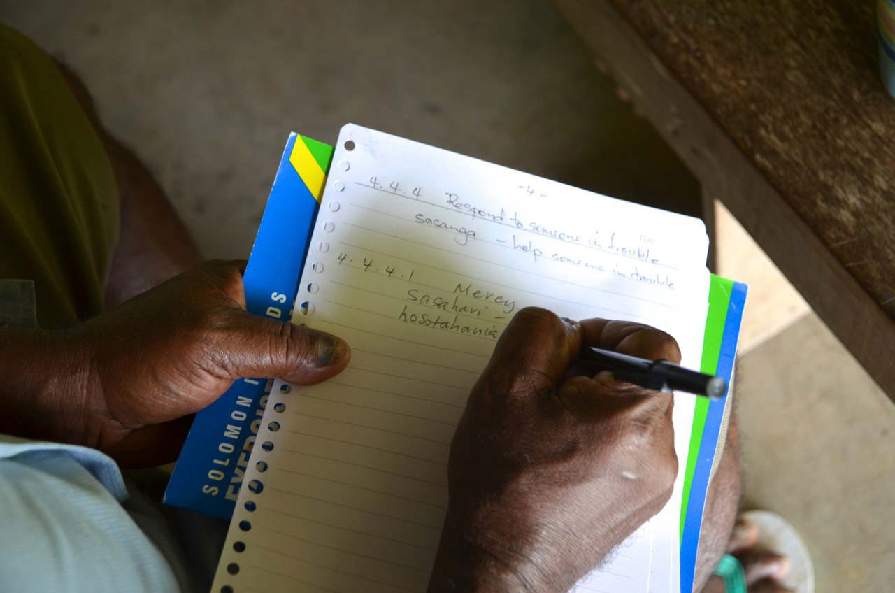 writing in notebook